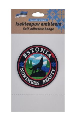 Embleem hundiga ümmargune